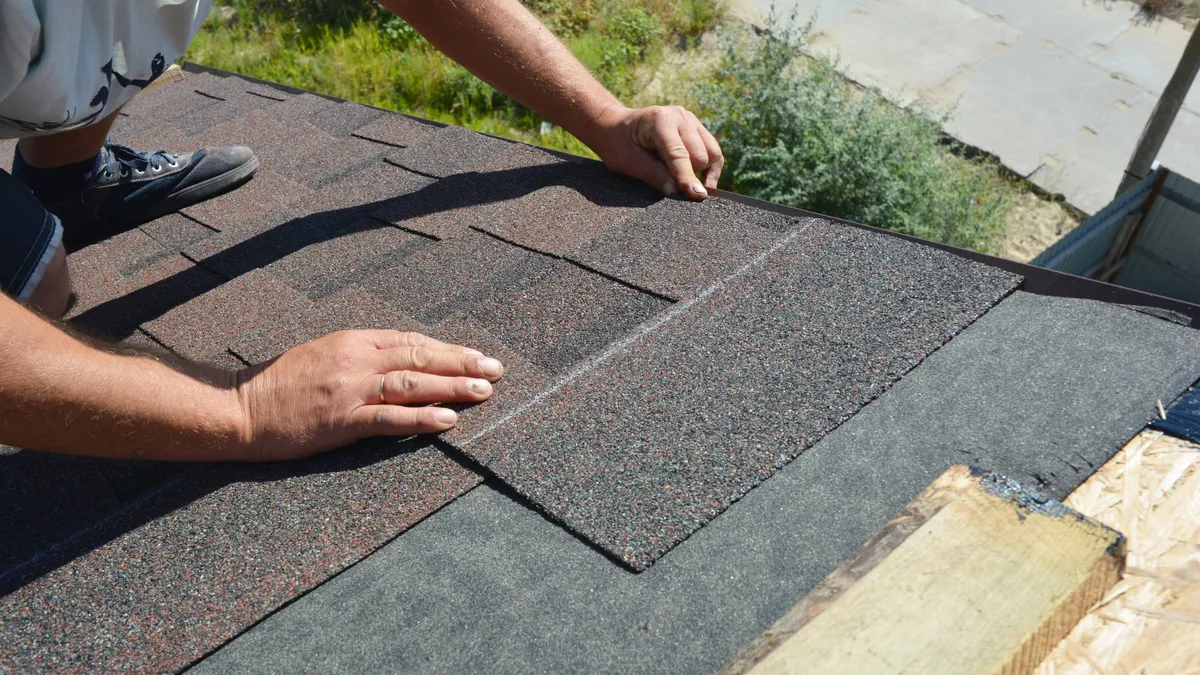 Emergency roof repair on a damaged roof
